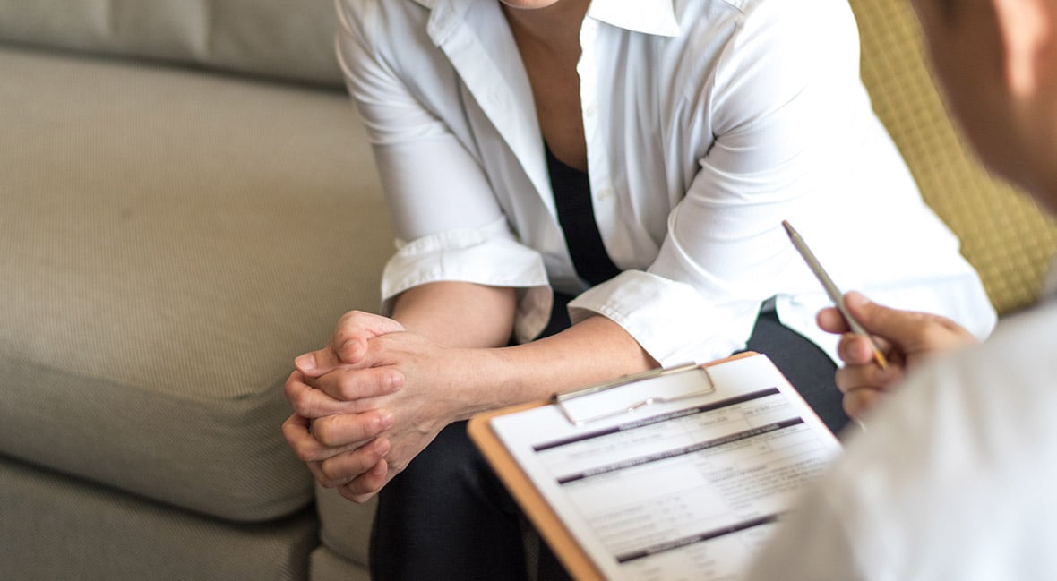 doctor consulting female patient